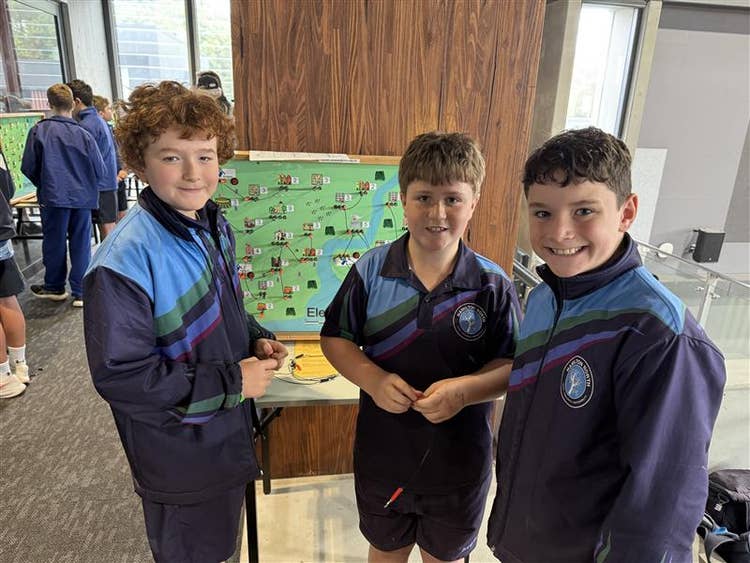 Three boy students on an a STEM excursion